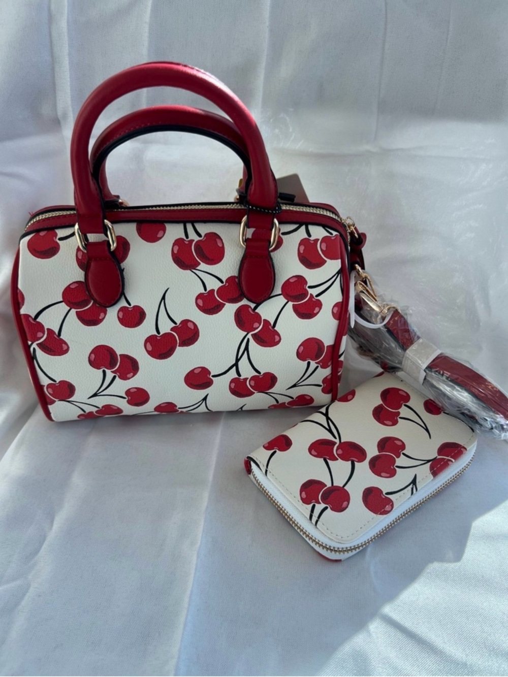 Eye-catching cherry print bag and matching wallet set